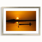 Abstract art print of a Mali landscape in muted earth tones on a framed silver mat, suitable for dining room decor.