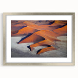 Abstract art print of a Namibian landscape in muted earth tones on a framed silver mat, ideal for dining room decor.