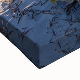 Large art featuring a black and white landscape painting of the African savannah on stretched canvas.