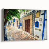 Landscape art painting of a Tunisian scenery on framed canvas, featuring vibrant colors and black vintage poster art accents.