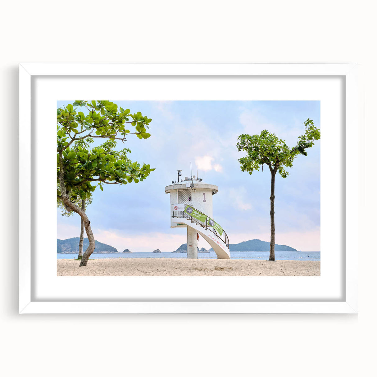 Abstract art print of Hong Kong skyline in muted gray and blue tones, framed with a white mat.