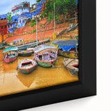Extra large framed canvas featuring a textured depiction of a vibrant Indian scenery in black with colorful accents.