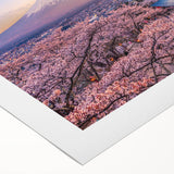 Art deco poster of Mount Fuji with muted blue and white tones on rolled canvas, suitable for dining room decor.