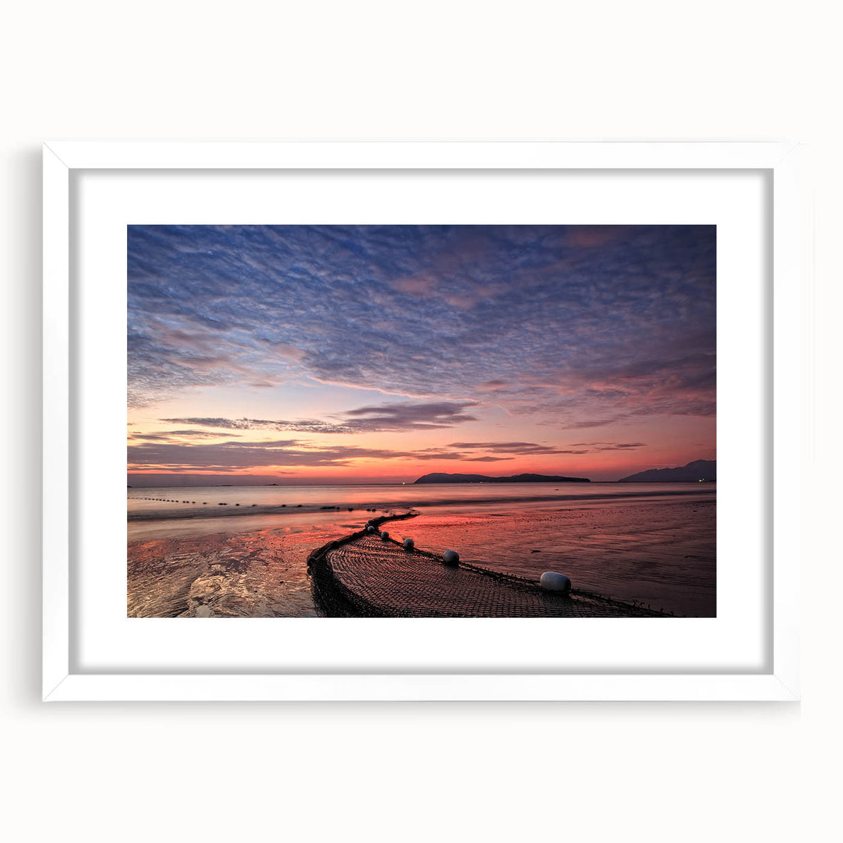 Abstract art print of a Malaysian landscape in muted earth tones on a framed white mat.