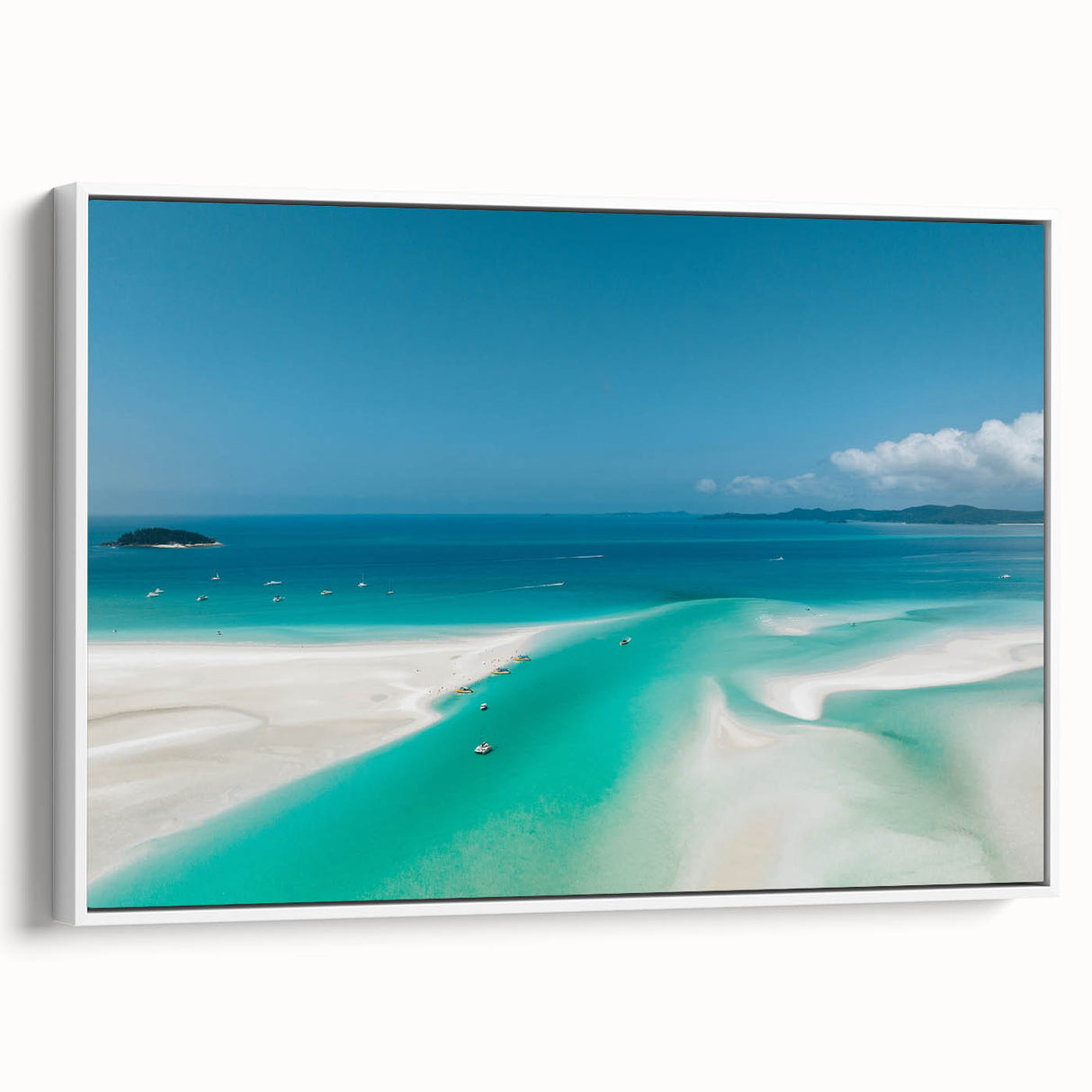 Framed canvas featuring a landscape painting of the Great Barrier Reef in muted blue and green tones.