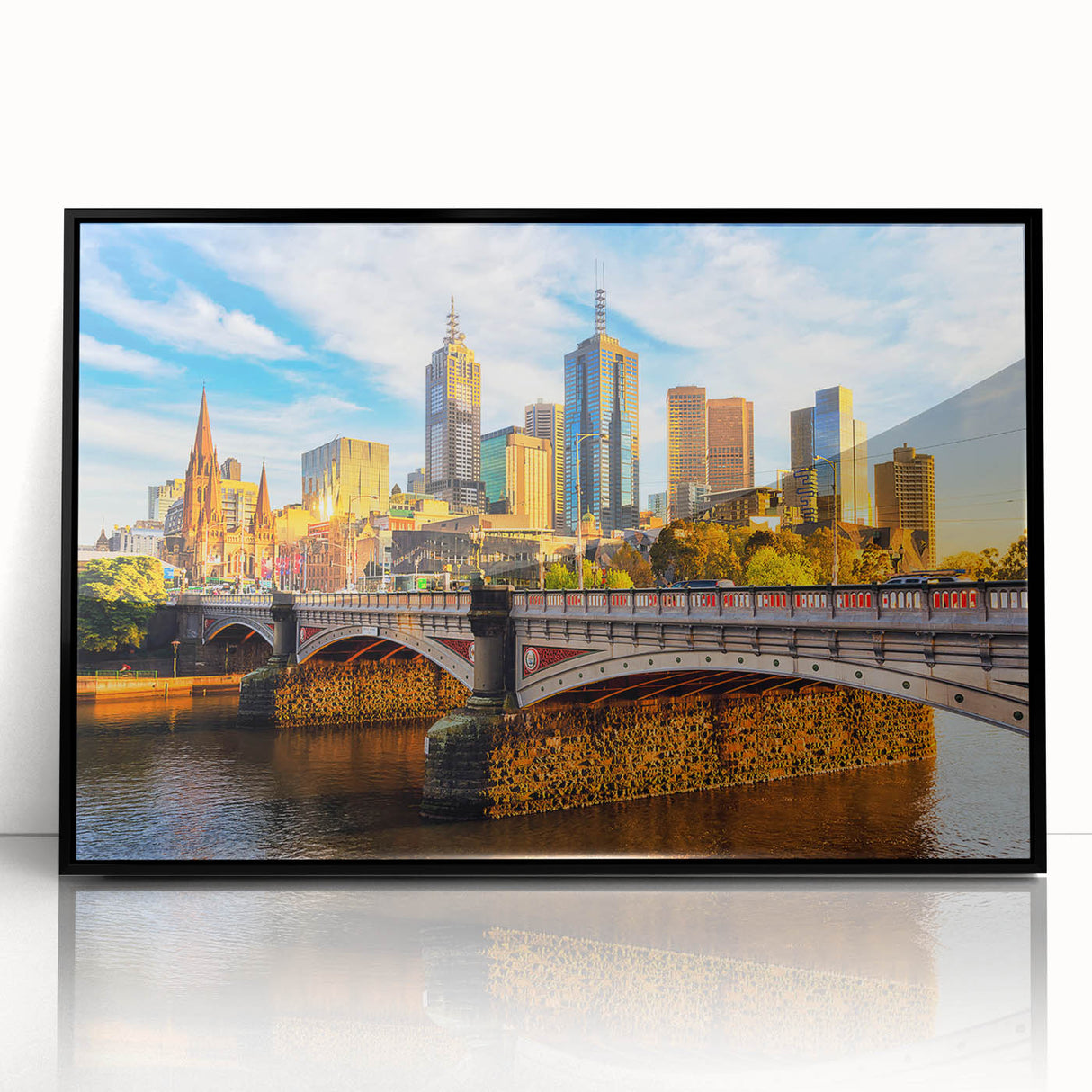 Large abstract wall art depicting Melbourne's skyline in muted gray and blue tones on black framed acrylic.