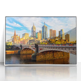 Acrylic print of Melbourne skyline in muted gray and blue tones on a white frame, ideal for modern art wall decor.
