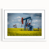 Abstract art print of Saskatchewan scenery in muted earth tones on a white-matted frame.