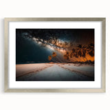 Abstract art print of a Caribbean scenery in muted blue and green tones on a framed silver mat, ideal for dining room decor.
