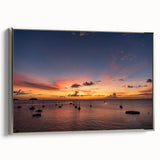 Framed canvas of a vintage-style landscape painting depicting the Caribbean coast, with vivid blue and green tones.