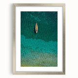 Textured abstract art print of a Caribbean landscape in muted blue and green tones, framed in silver, ideal for bedroom art.