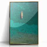Large art print of a Caribbean Saint Lucia scenery in gold framed acrylic, depicting vibrant ocean blues and lush greens.