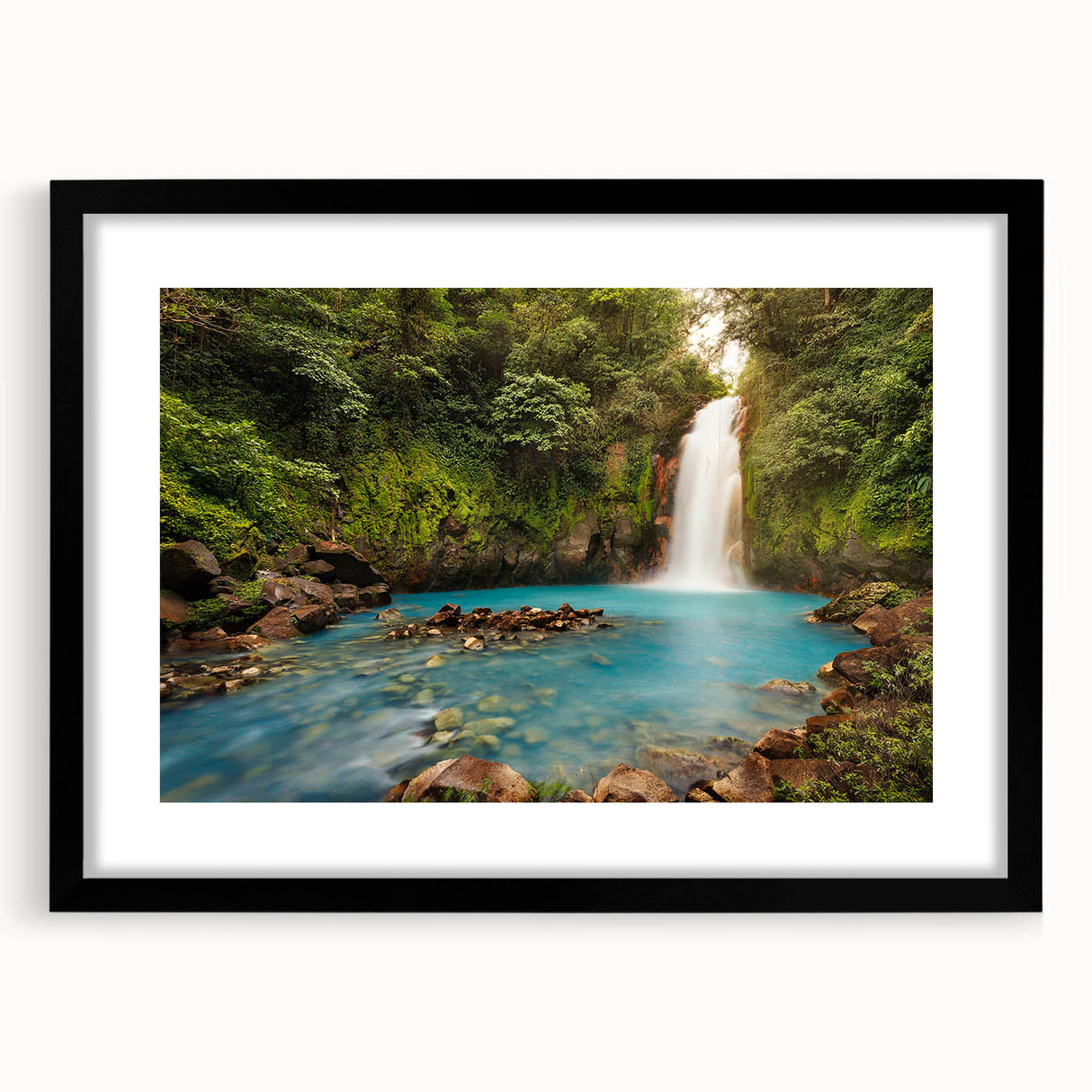 Extra large abstract art print depicting a colorful, textured scenery of Central America, framed in black.