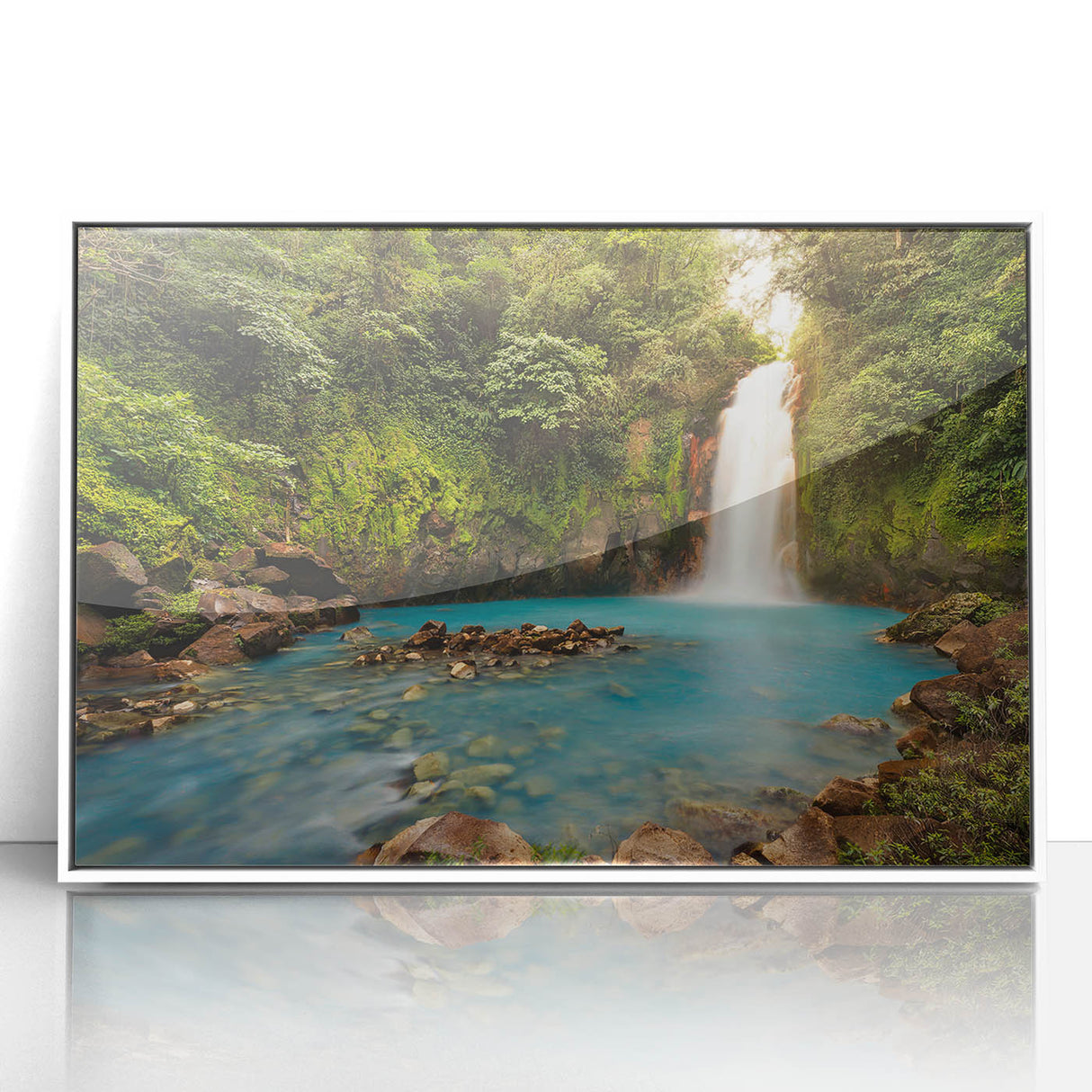 Acrylic print of a Costa Rican landscape in pastel colors, framed in white, suitable for nursery wall art.