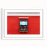 Abstract art print of a Central American landscape in muted earth tones, framed with a white mat.