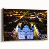 Framed canvas wall art of a vintage-style Honduran landscape in muted gold and black tones, ideal for bedroom decor.