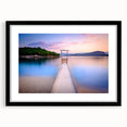 Extra large abstract art print of a colorful European scenery on textured canvas, framed in black.