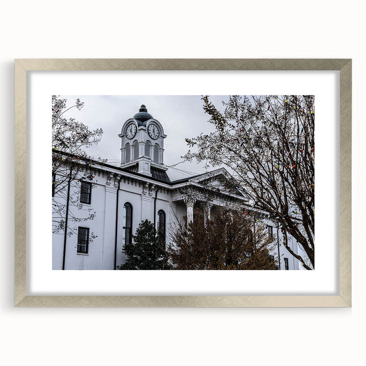 Extra large abstract art print depicting a textured scenery of Oxford, in muted earth tones, framed in silver.