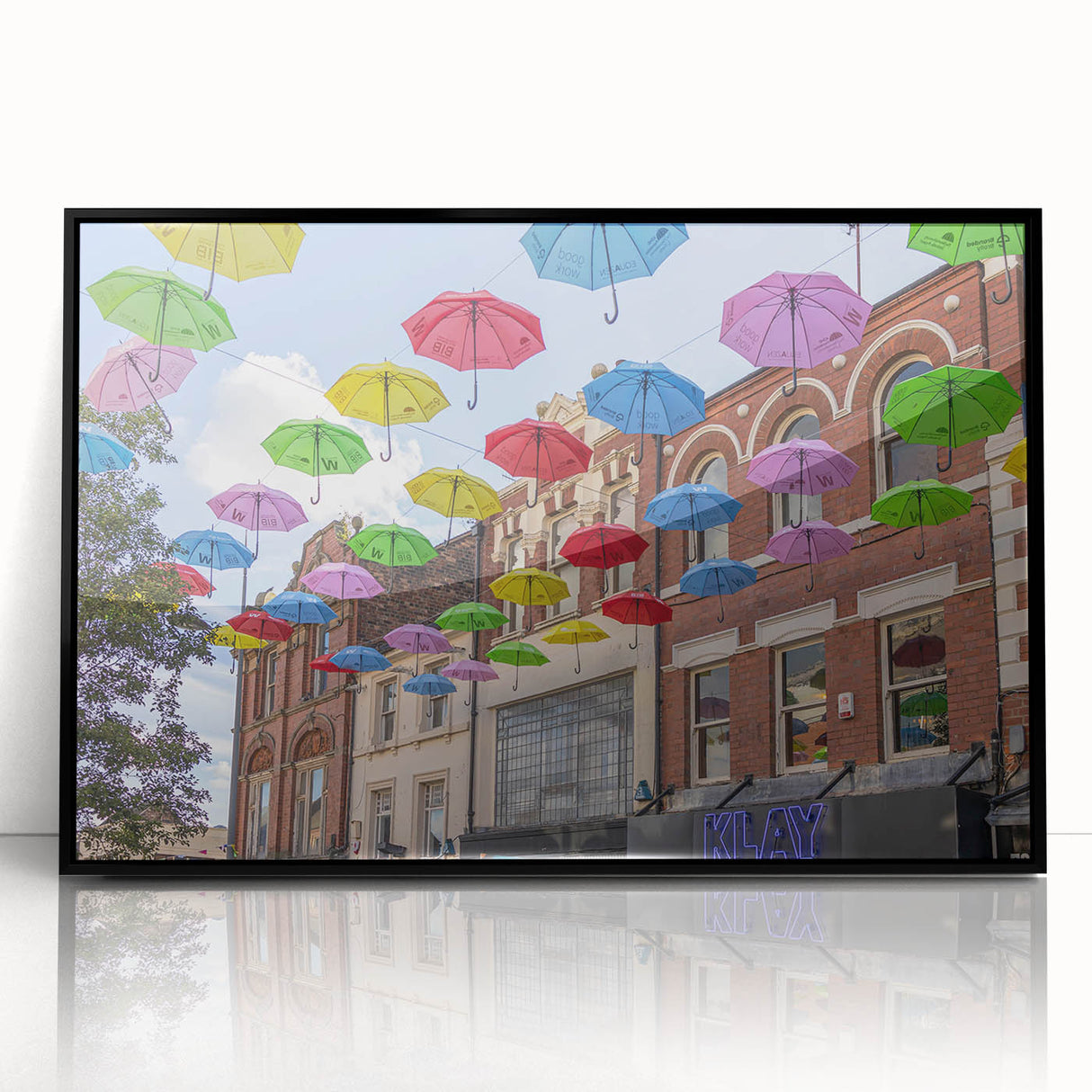 Large abstract wall art of Piccadilly, England in muted gray and black tones on framed acrylic.