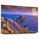 Large abstract wall art of the Corsican coast in muted blues and greens on acrylic glass.