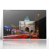 Mid-century modernist art of Munich scenery in muted earth tones on a white framed acrylic.