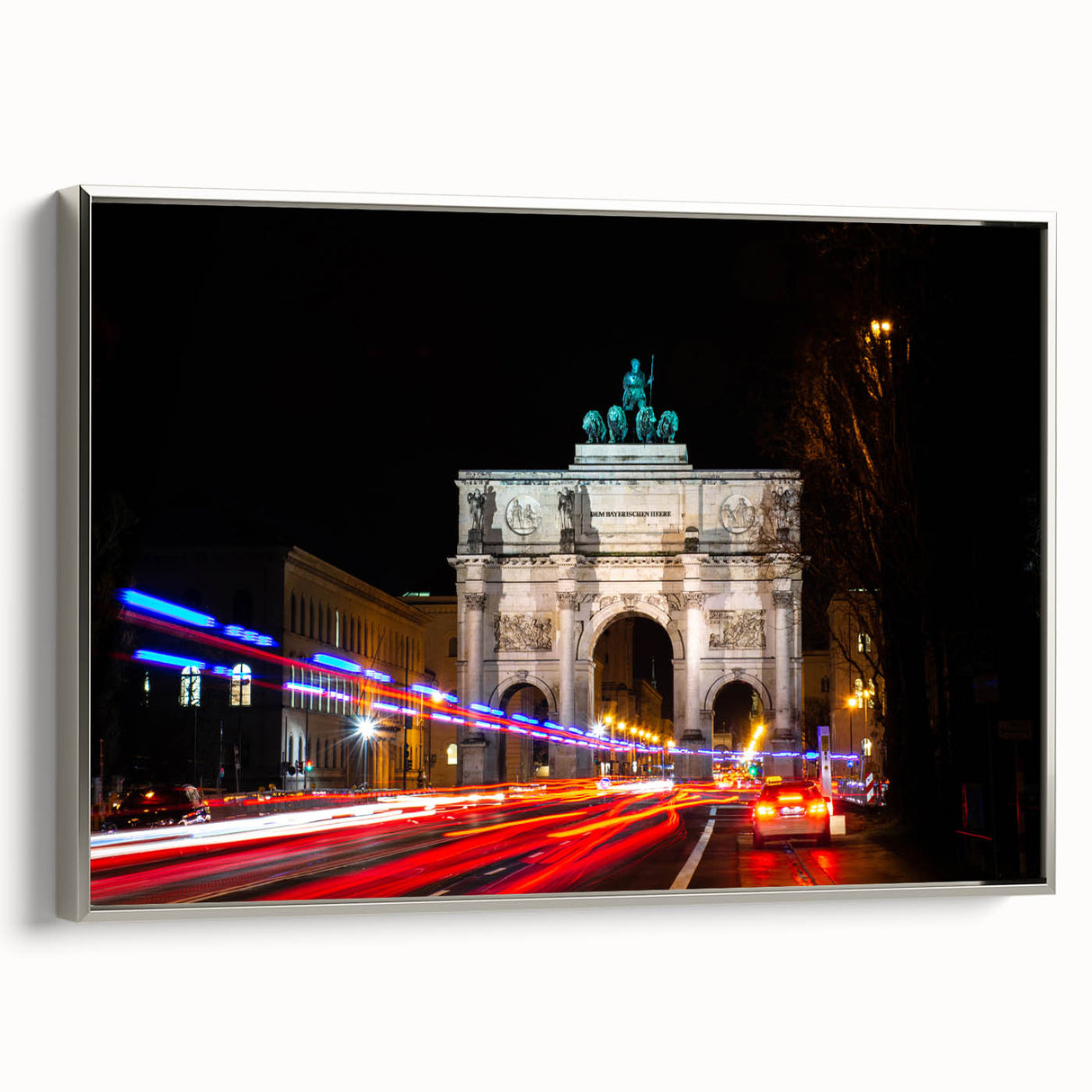 Framed canvas featuring a vintage landscape painting of Munich with a black border and colorful details.