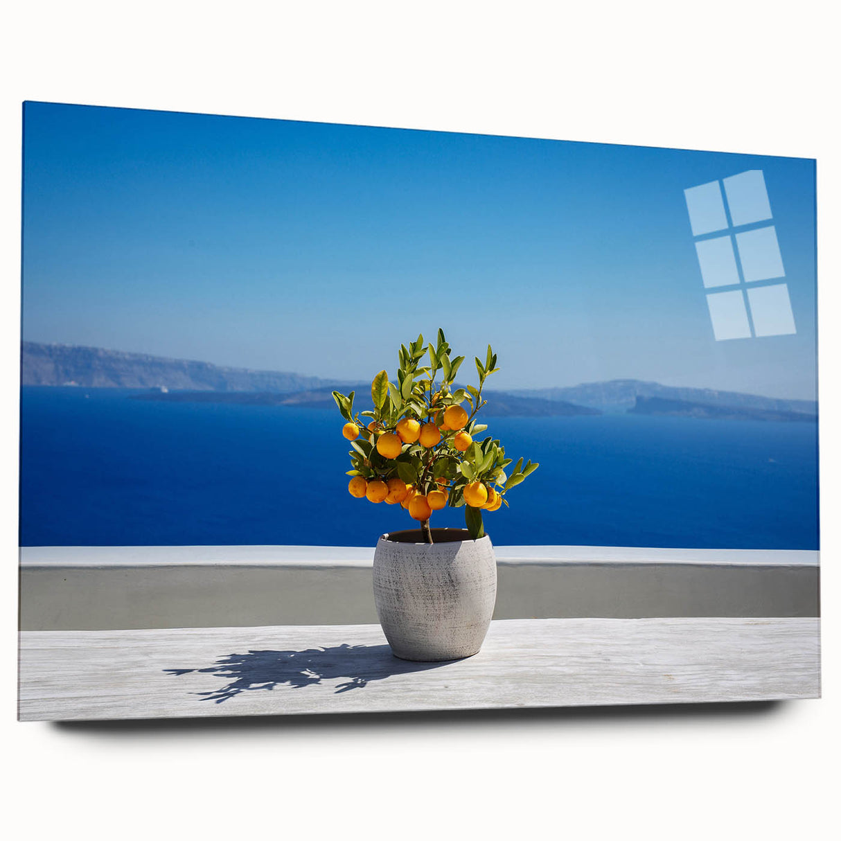 Acrylic print of Santorini landscape with deep blue and white hues, ideal for bedroom or dining room art.