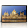 Large abstract wall art featuring a mid-century modernist depiction of a European scenery in black acrylic frame.