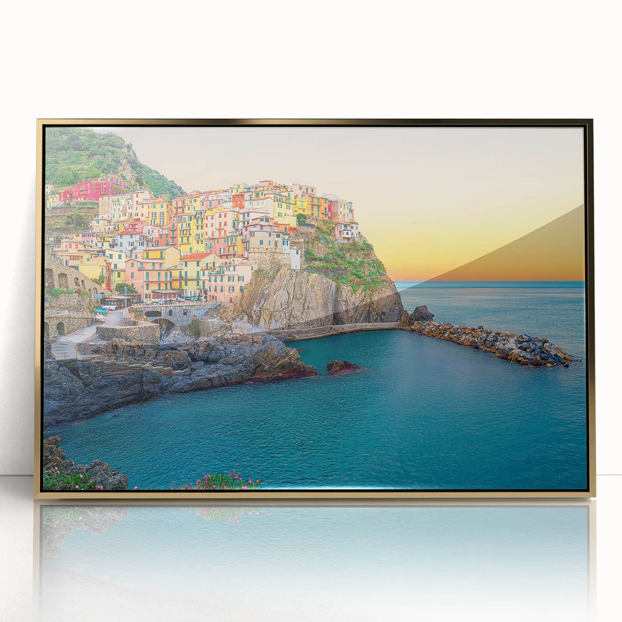 Framed acrylic print of Cinque Terre with pastel shades, ideal for modern art wall decor in a nursery.