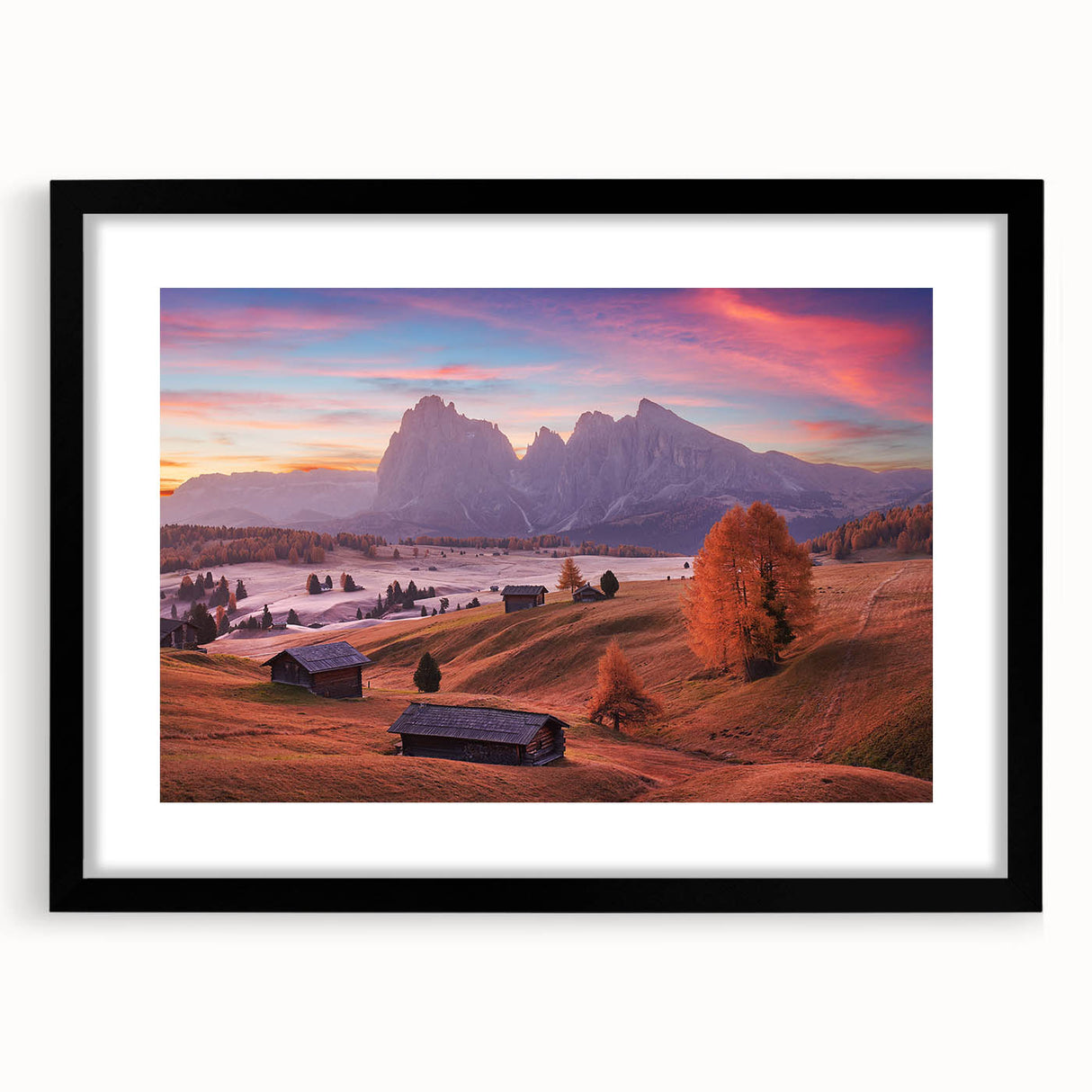 Extra large abstract print of Dolomites in vibrant colors on a black framed canvas, suitable for living room decor.