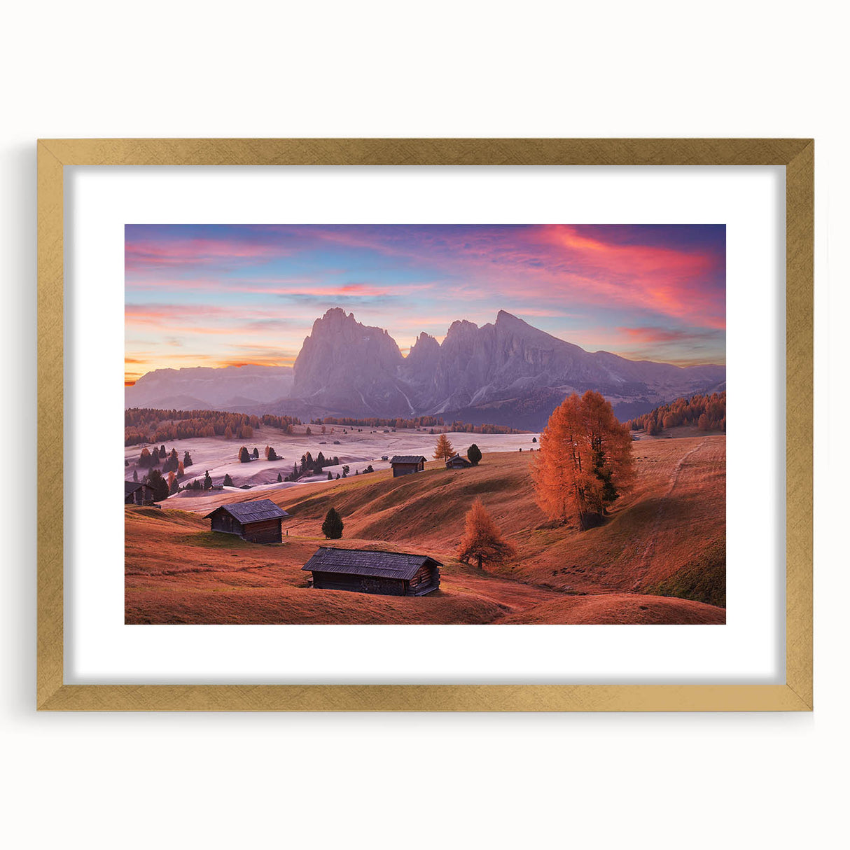 Abstract art print of the Dolomites in Italy, featuring muted earth tones on a framed gold mat, ideal for dining room decor.