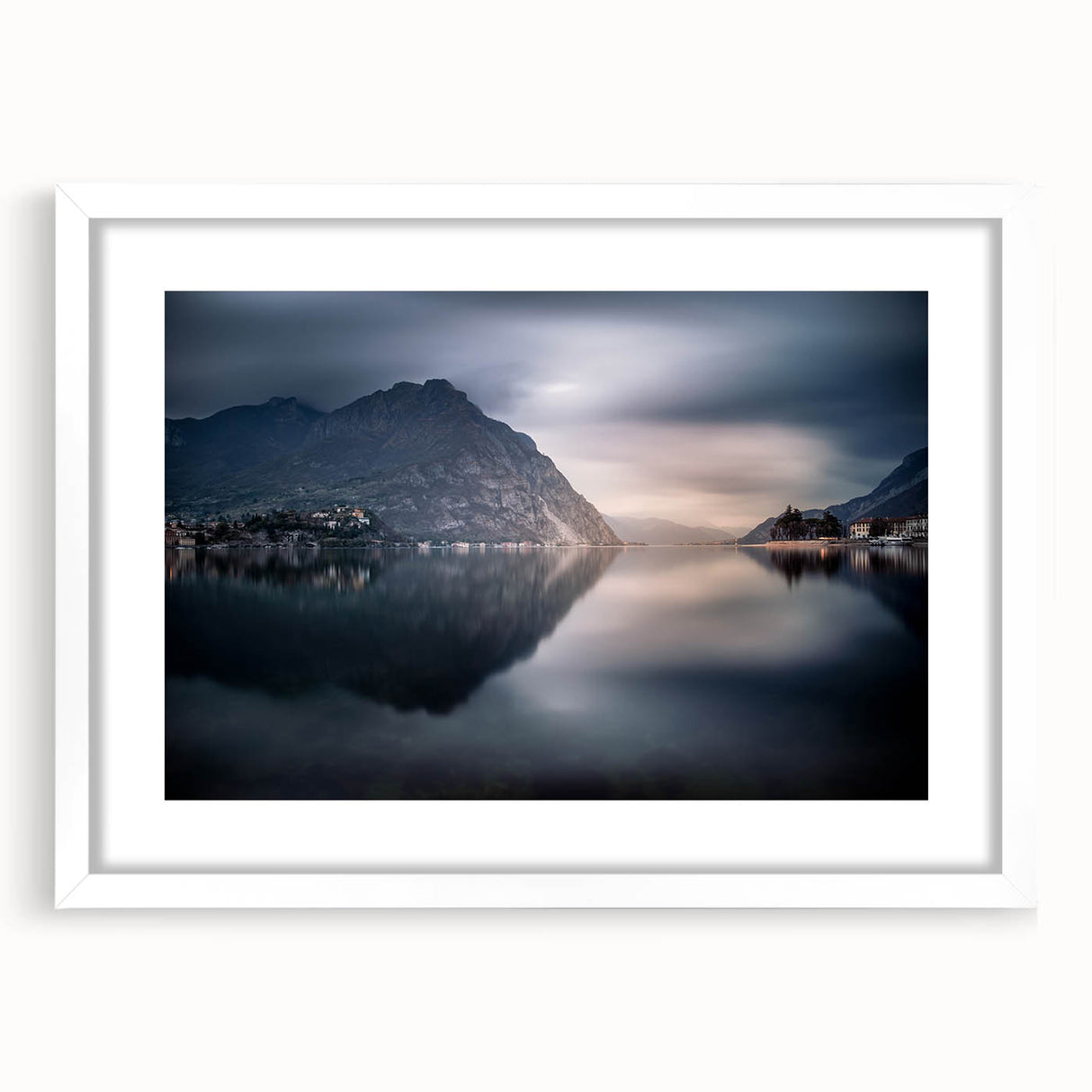 Textured art print of Lake Como with abstract elements in muted blue and green tones, framed with a white mat.