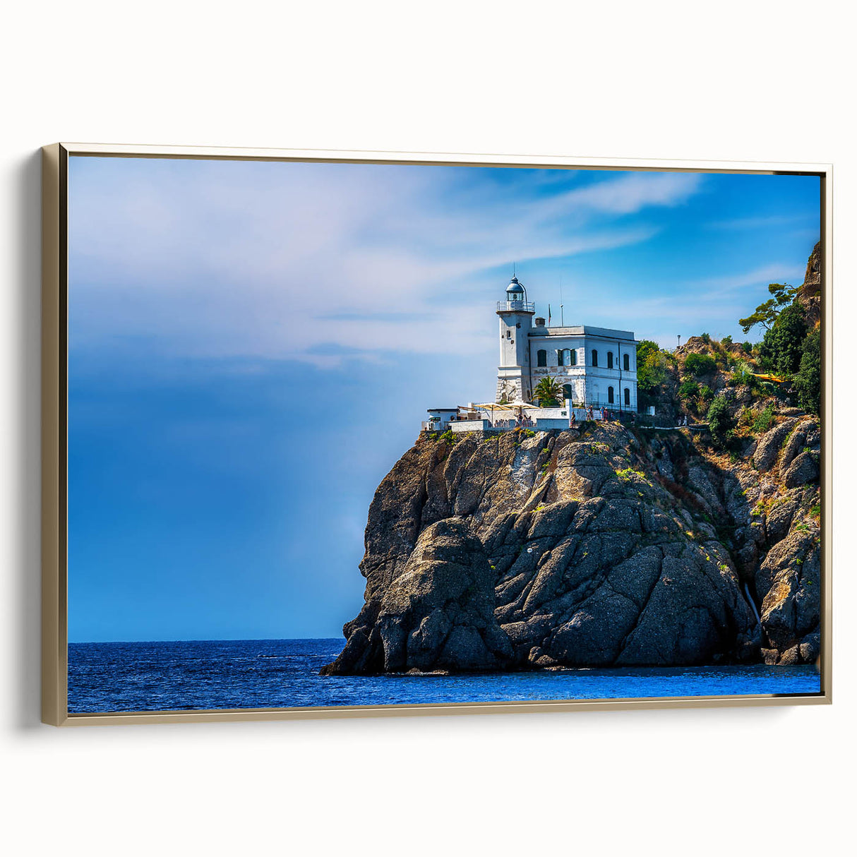 Framed canvas depicting a vintage-style landscape painting of Portofino, Italy, with muted gold and black tones.
