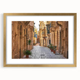Abstract art print of Malta scenery in muted earth tones on a framed canvas, suitable for dining room decor.