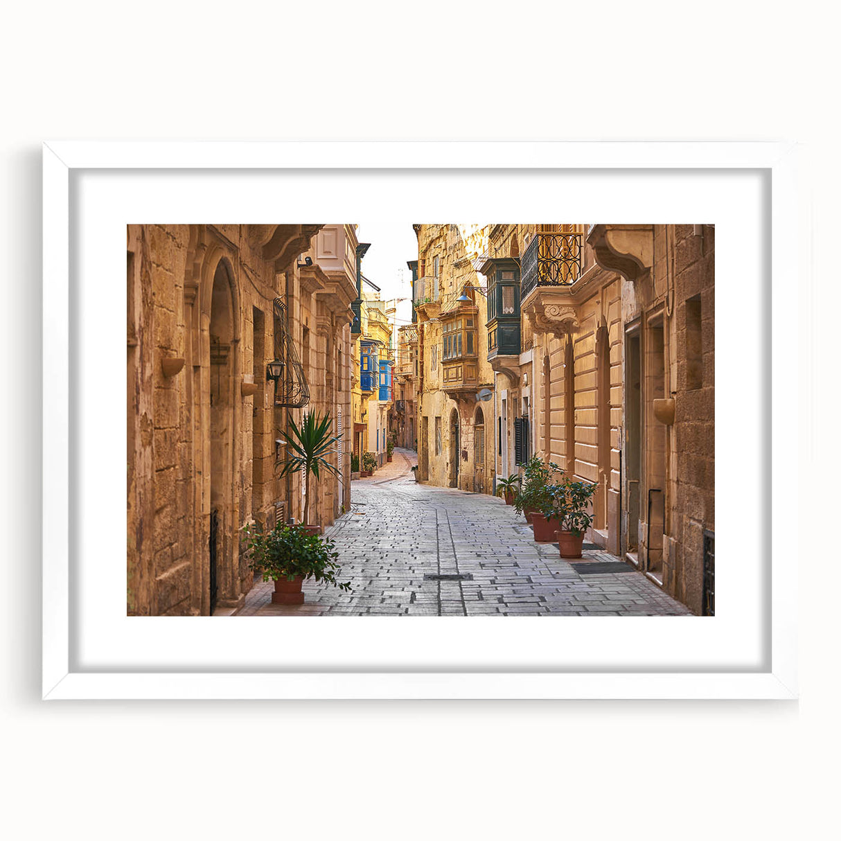 Textured abstract art print depicting a European Malta scenery in muted earth tones, framed with a white mat.