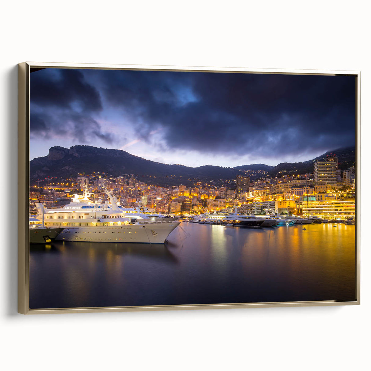 Framed canvas depicting a vintage-style Monaco landscape in muted gold and black tones, ideal for bedroom wall art.