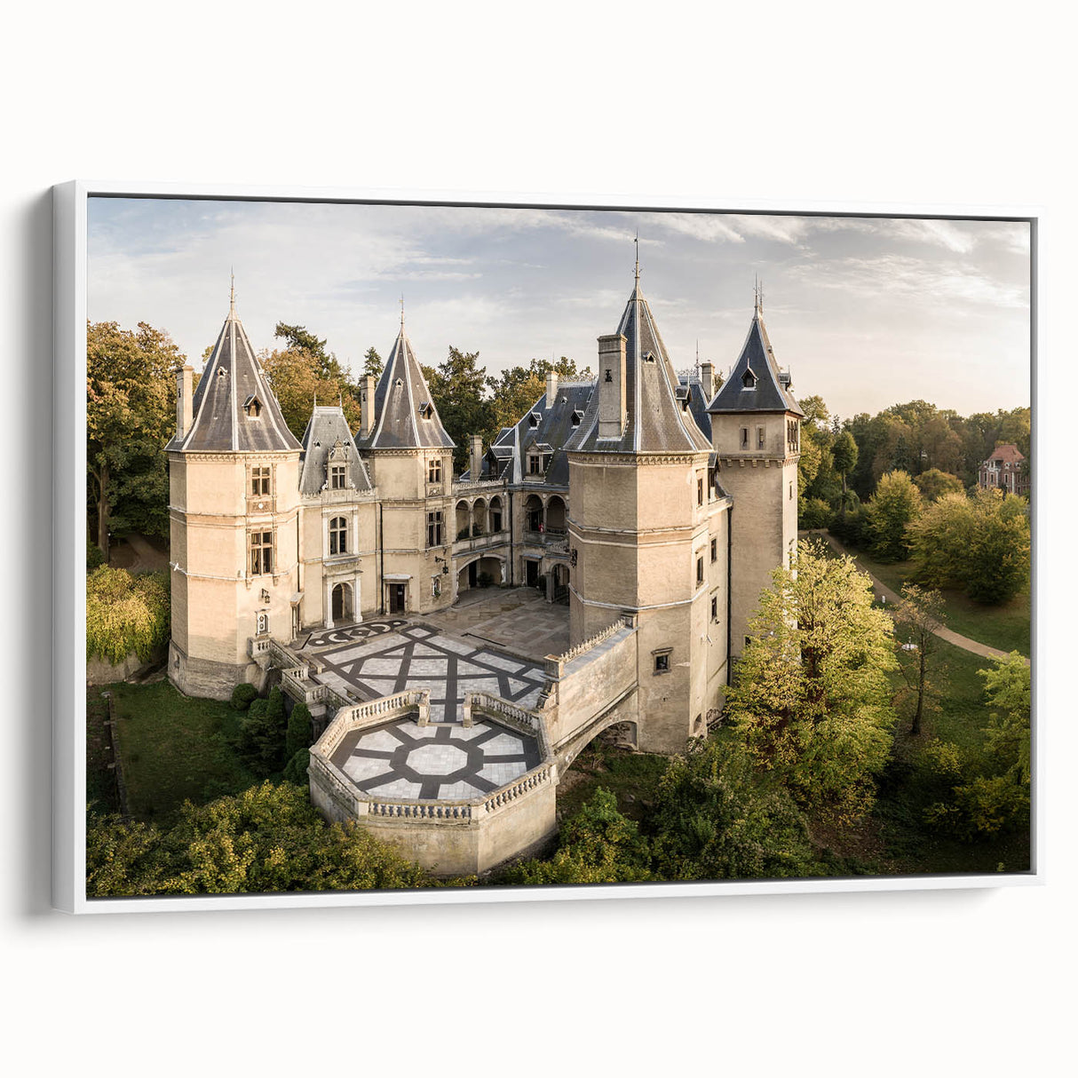 Vintage poster art of a scenic European town in Poland, displayed on a large framed canvas with vibrant colorful accents.