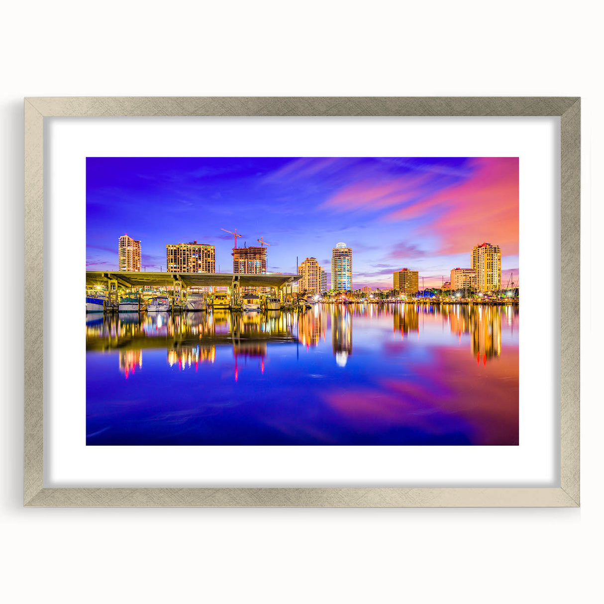 Extra large abstract art print of a textured European cityscape in cool gray tones, framed in silver.