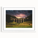 Textured abstract art print depicting a European scenery in muted earth tones, framed in white, suitable for bedroom decor.