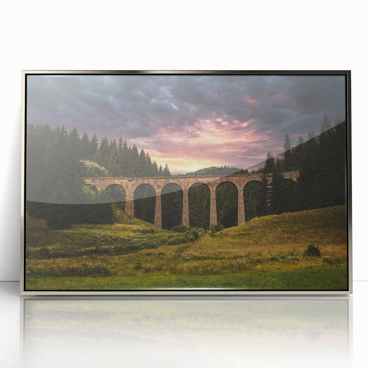 Large art print depicting a serene Slovakian landscape in muted green and blue tones, framed in silver acrylic.