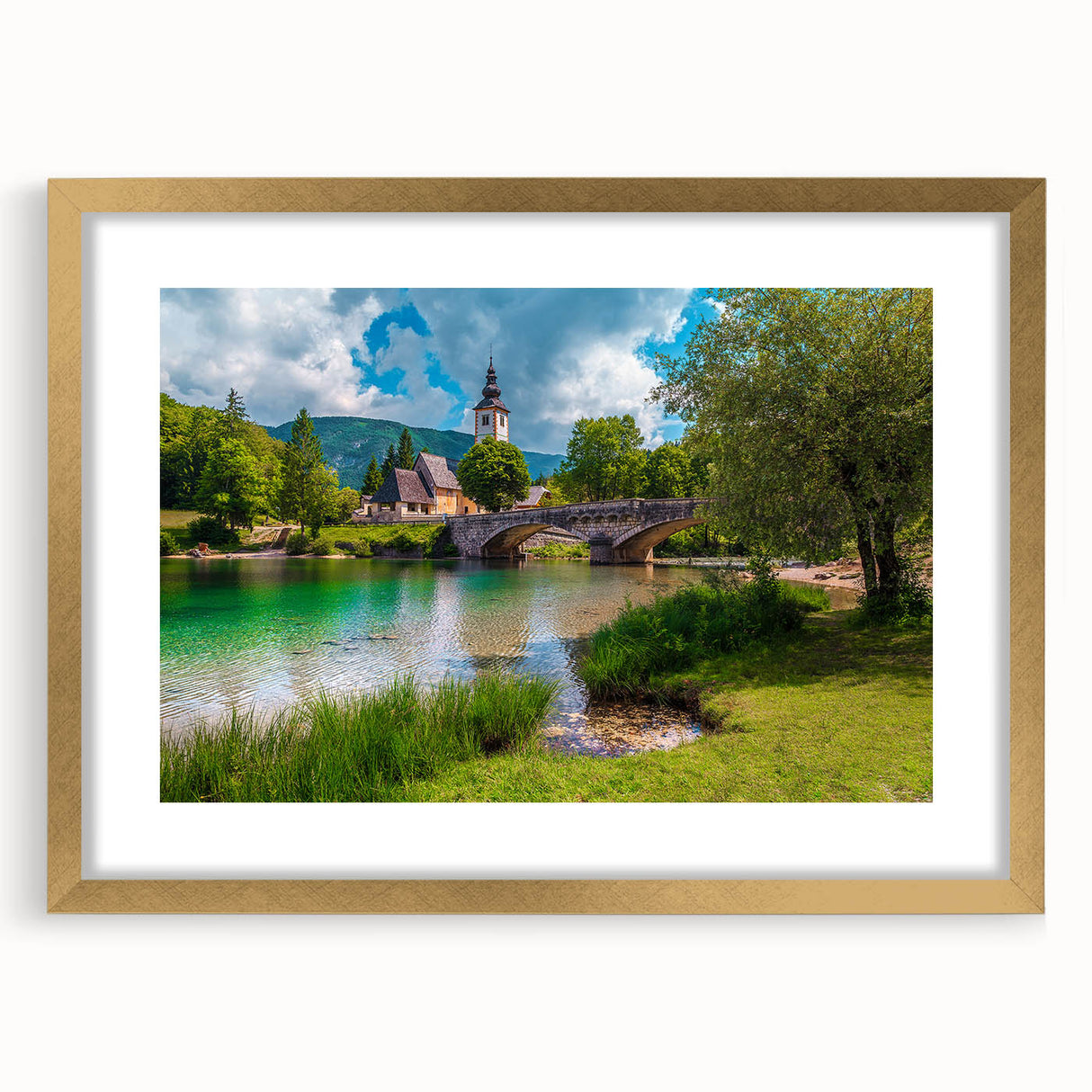Textured art print of abstract European scenery in muted earth tones, framed with a gold mat, ideal for bedroom decor.