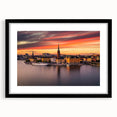 Abstract art print of Stockholm scenery in vibrant colors on a large framed canvas, ideal for living room decor.