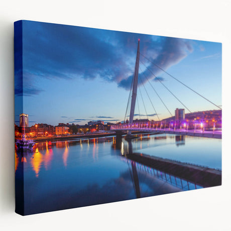 Side view of a stretched canvas featuring a serene Welsh landscape in earthy green and blue tones.