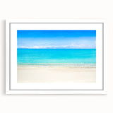 Abstract art print of Cancun scenery in muted blue and green tones on a framed white mat.