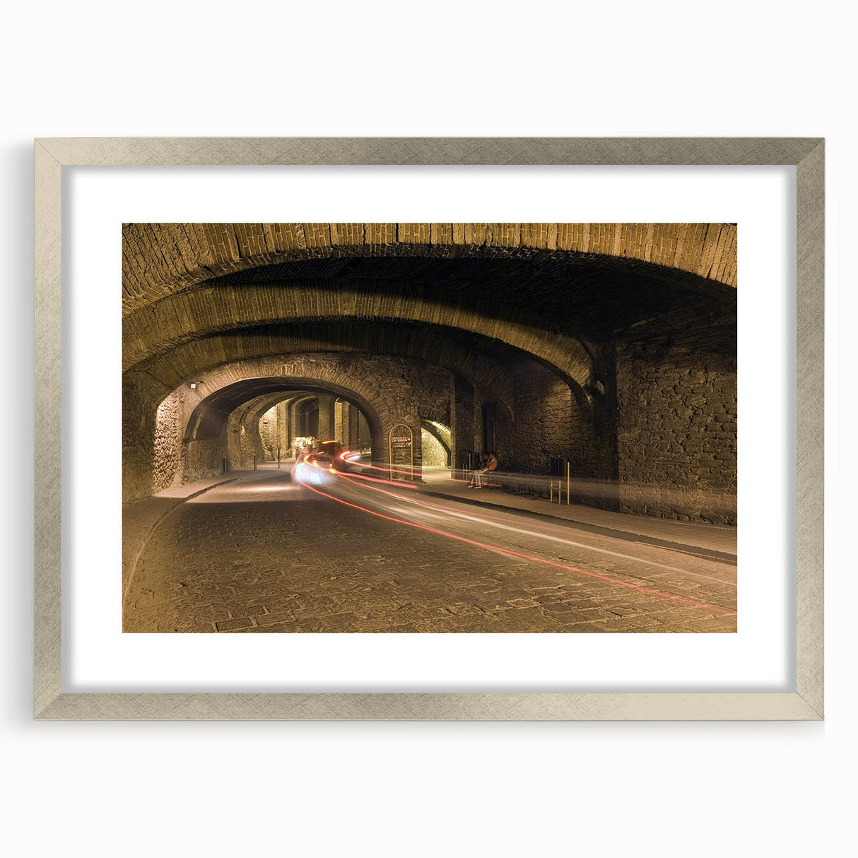 Textured art print of Guanajuato, Mexico, featuring abstract multicolored patterns, displayed in a silver frame.