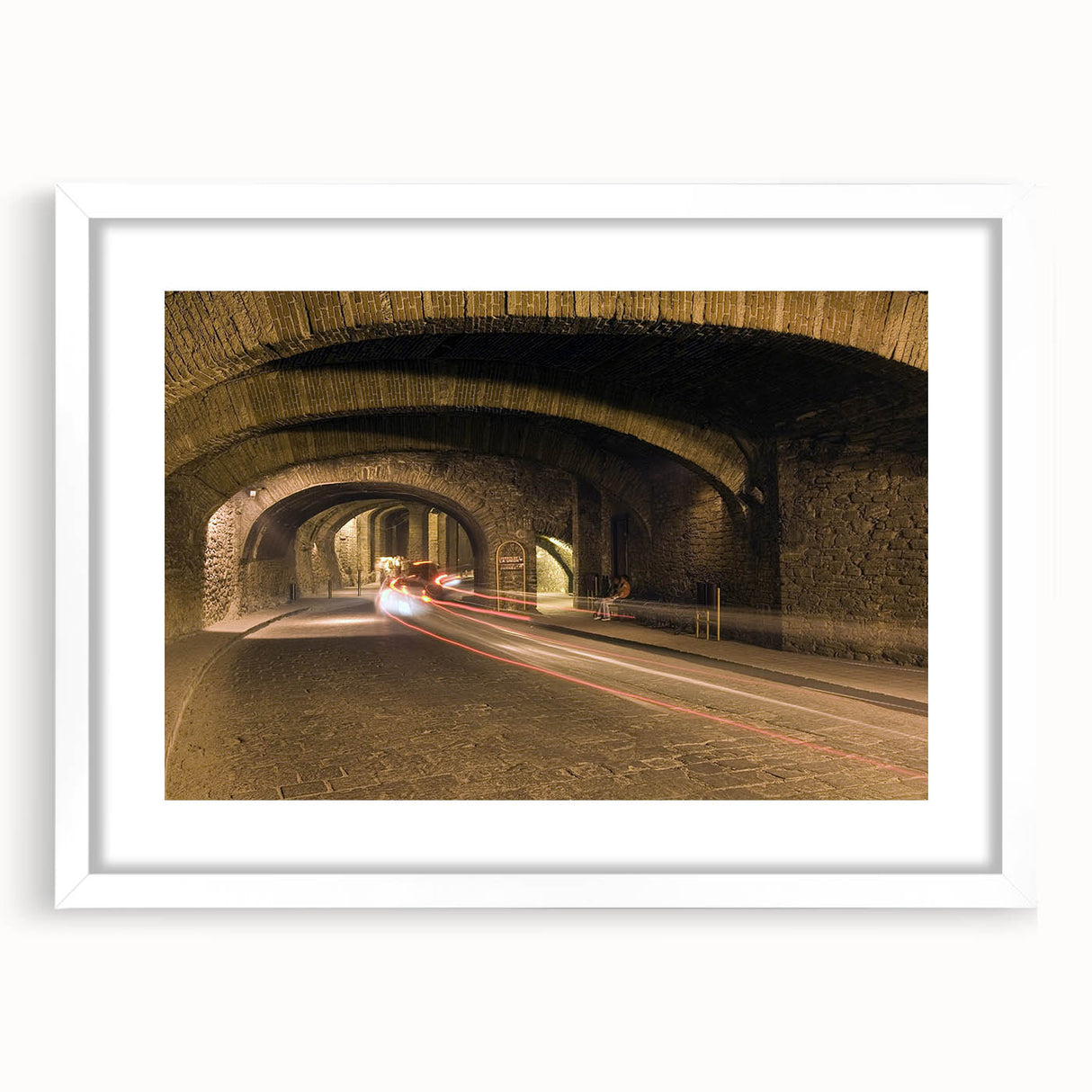 Abstract art print of Guanajuato scenery in muted earth tones on a framed white mat, suitable for dining room decor.