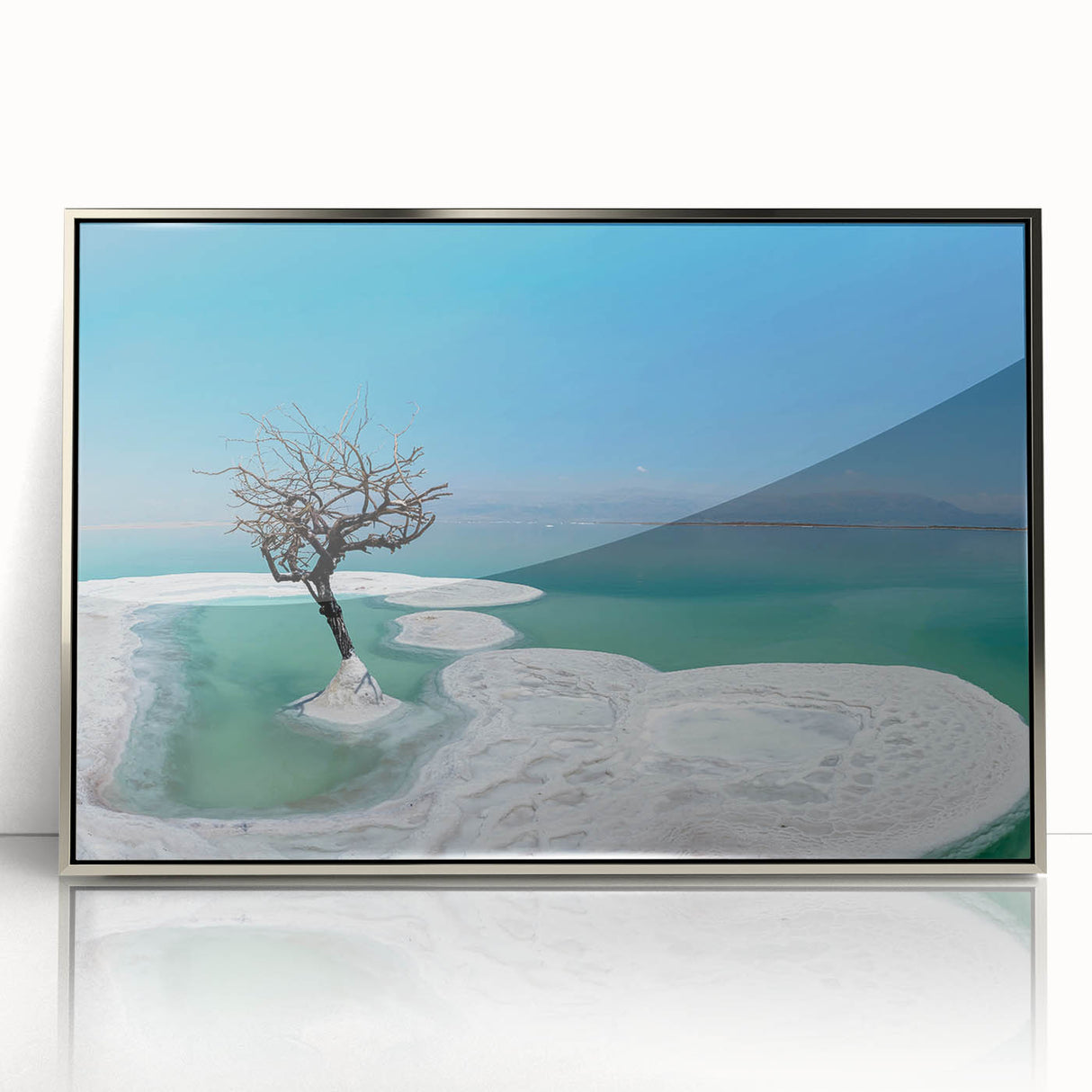 Mid-century modernist art of the Dead Sea in Israel, featuring muted blue and sandy tones on a framed acrylic print.