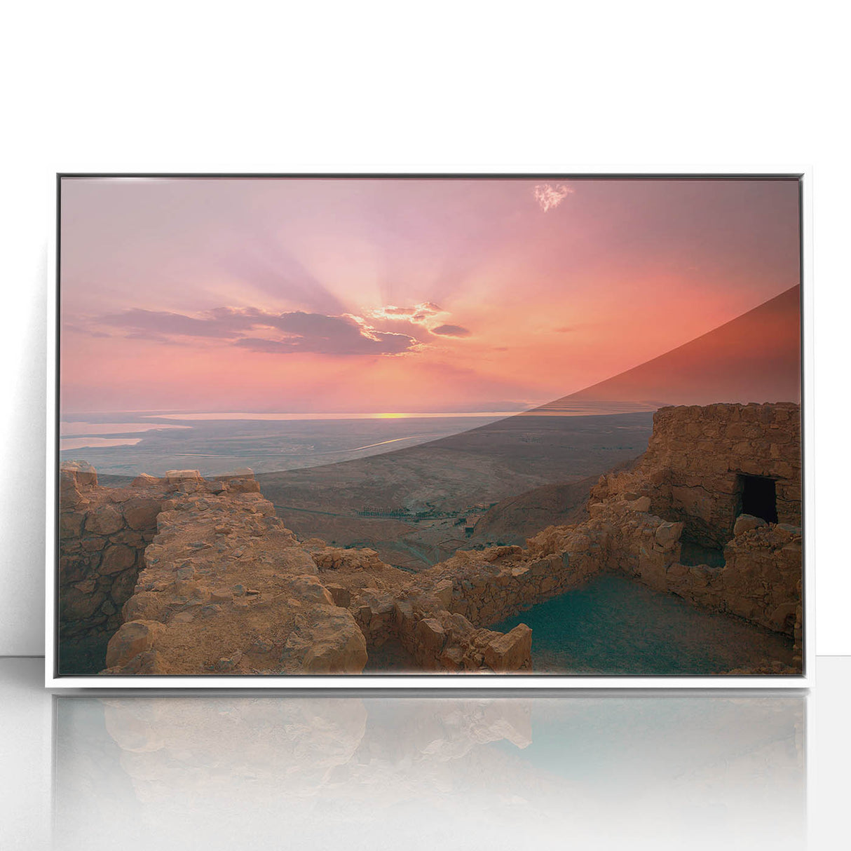 Framed acrylic print of an art deco poster featuring a Middle Eastern landscape, in muted earth tones.