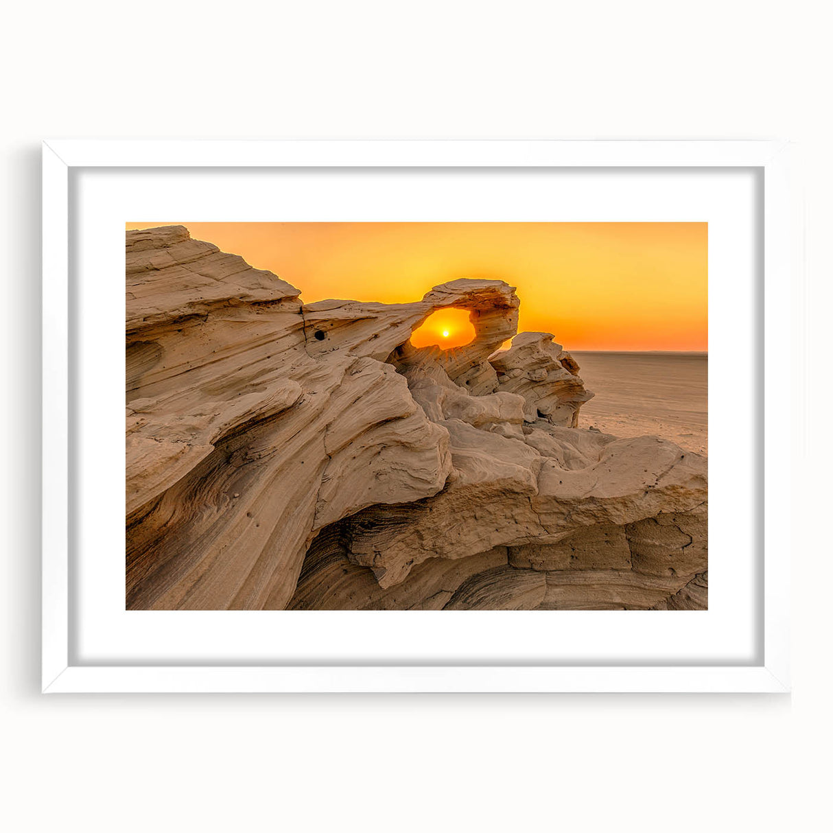 Abstract art print depicting the Abu Dhabi skyline in muted gray and blue tones on a framed white mat.