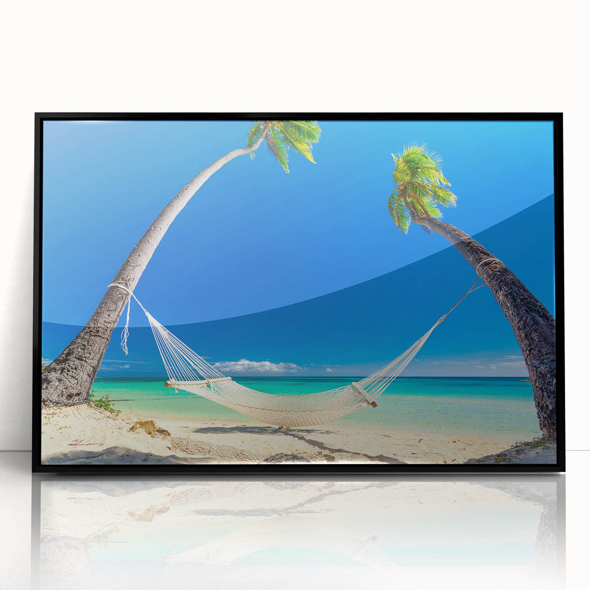 Large abstract wall art featuring a Fiji oceanscape in blue and teal hues, framed in black acrylic.